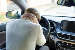A woman who was just injured from a fender bender.