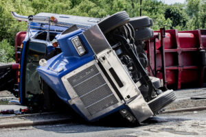 A semi-truck crashed and struck two other vehicles, leaving a driver with minor injuries in an Interstate 15 Freeway accident in Riverside.