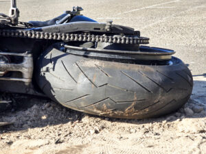 A motorcyclist was killed after colliding with a bicyclist in a San Gabriel River Trail crash in Long Beach.